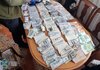 СБУ обнаружила более $300 тыс. во время обысков у руководительницы одной из районных ВВК в Днепропетровской области