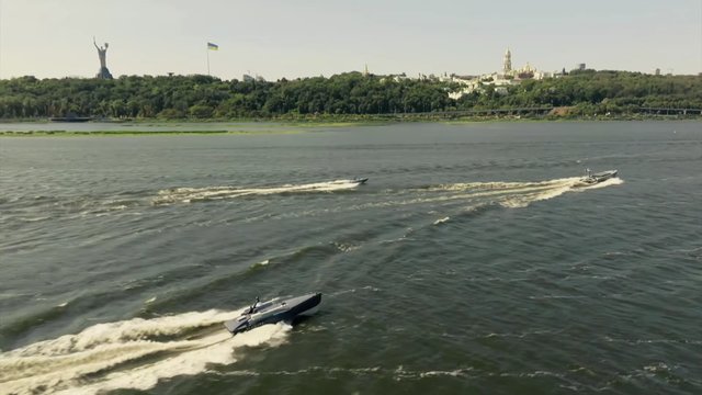 Parade of new Ukrainian-made equipment held on Kyiv streets, in the sky and on water at dawn